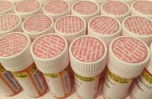 Rows of pharmaceutical vials